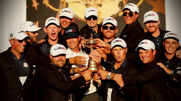 Team USA at Ryder Cup holding trophy 