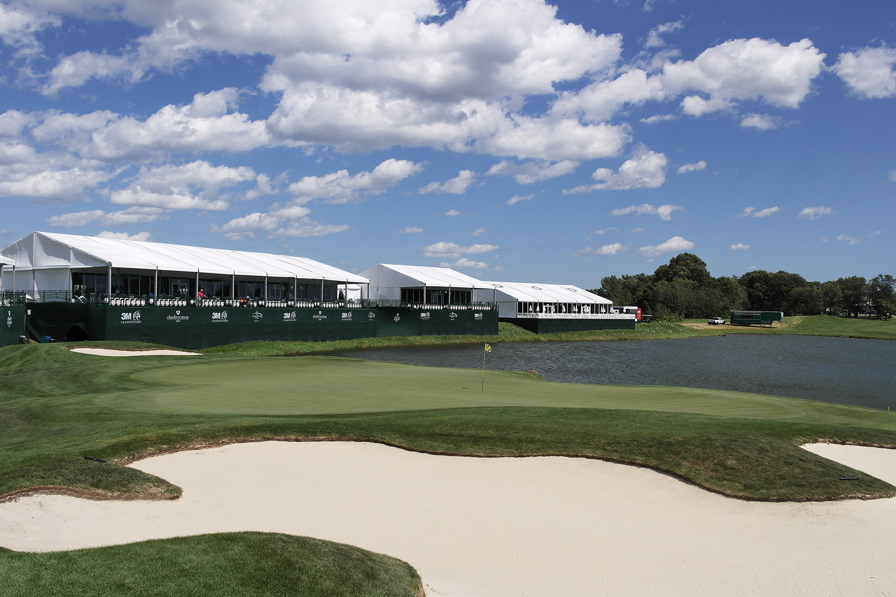 EMC view of the TCP Twin Cities golf course 18th green, sandpit and pond